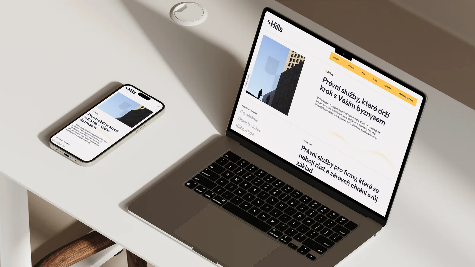 Hills Advisory — web na telefonu a MacBooku, právní služby